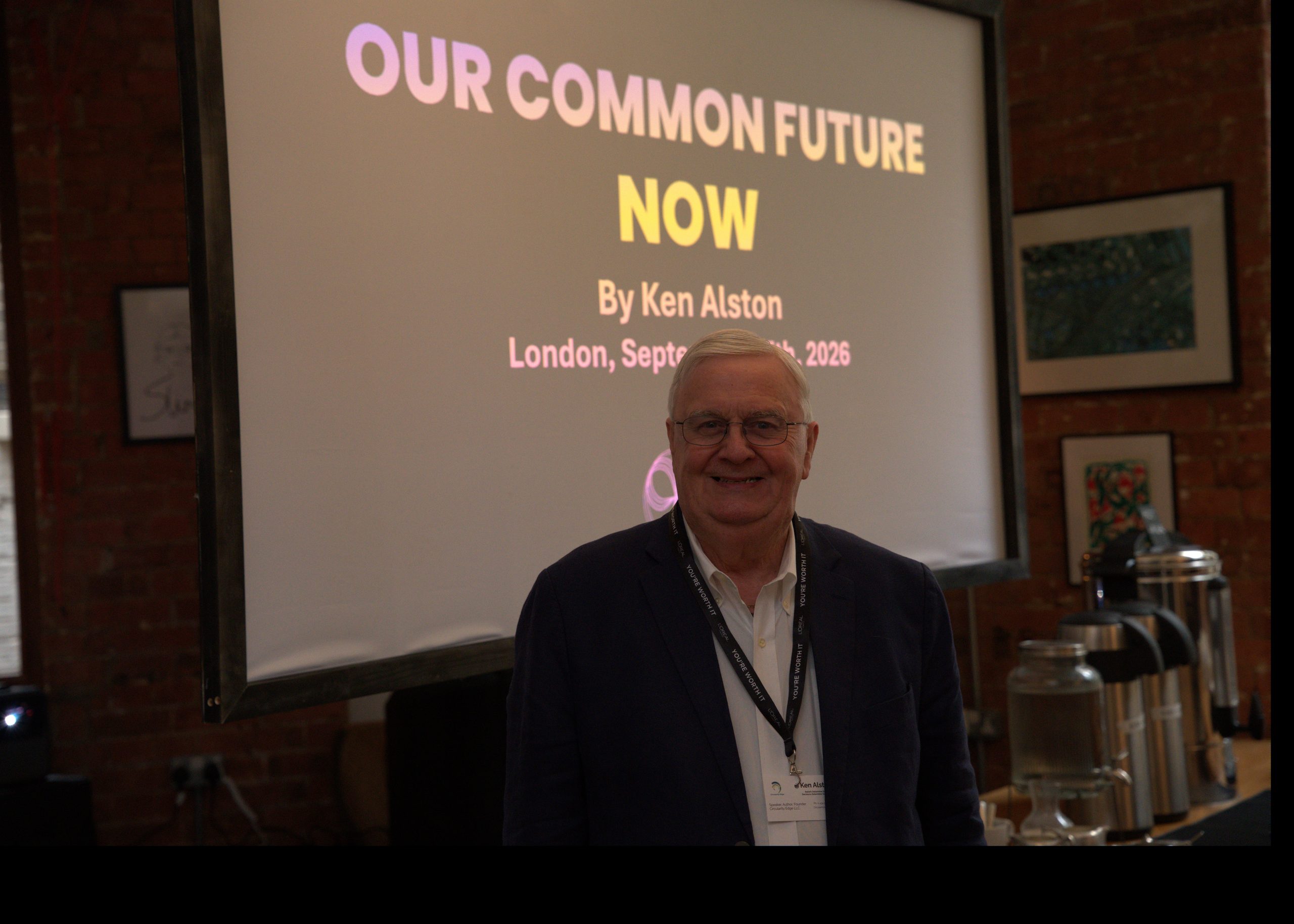 Ken Alston standing before the title slide for Our Common Future - Now at the Real Circularity Summit, London, September 2026.