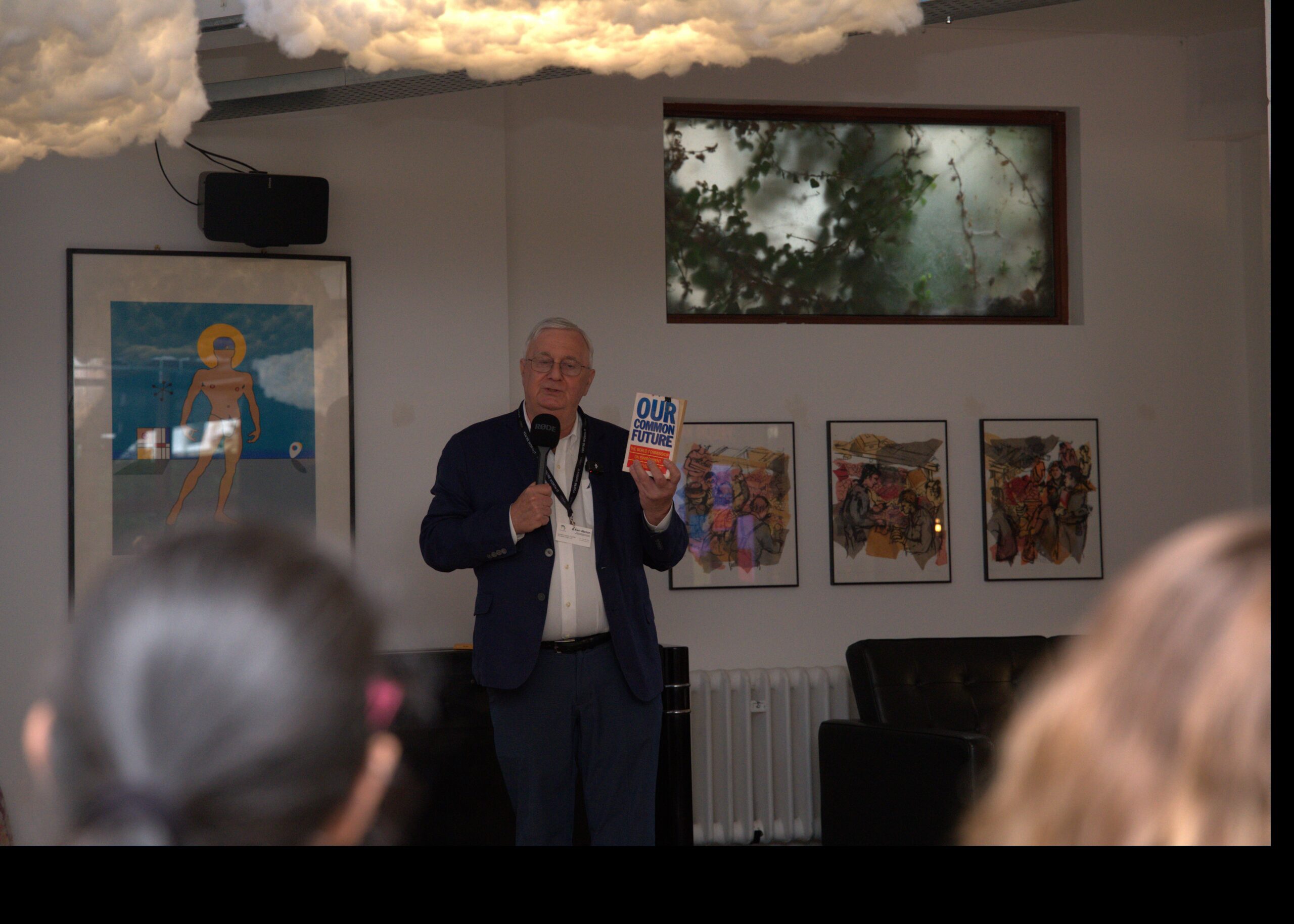 Ken Alston addressing an audience and holding Our Common Future - Now at the Real Circularity Summit, London, September 2026.