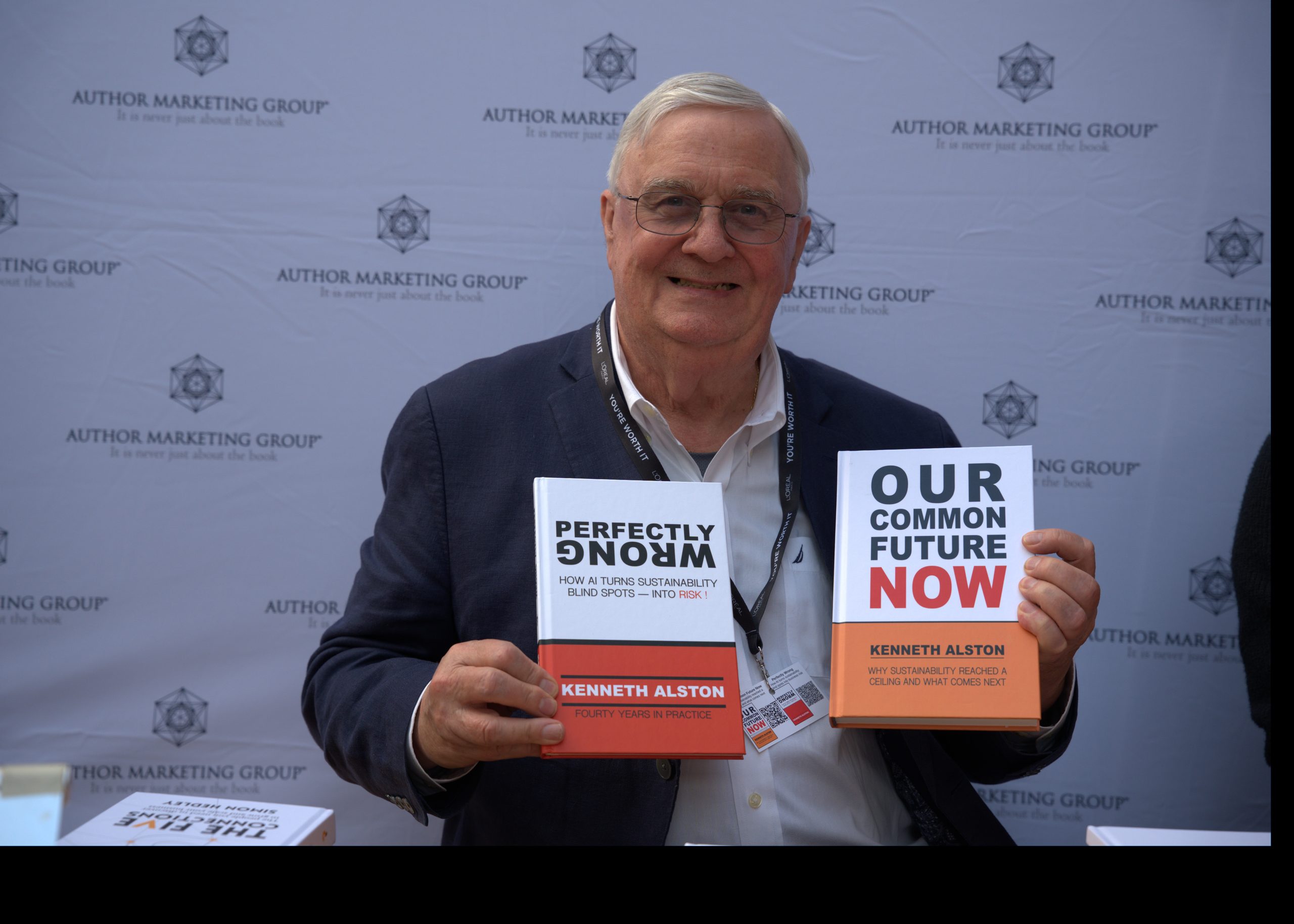 Ken Alston holding copies of Perfectly Wrong and Our Common Future - Now at the Real Circularity Summit, London, September 2026.